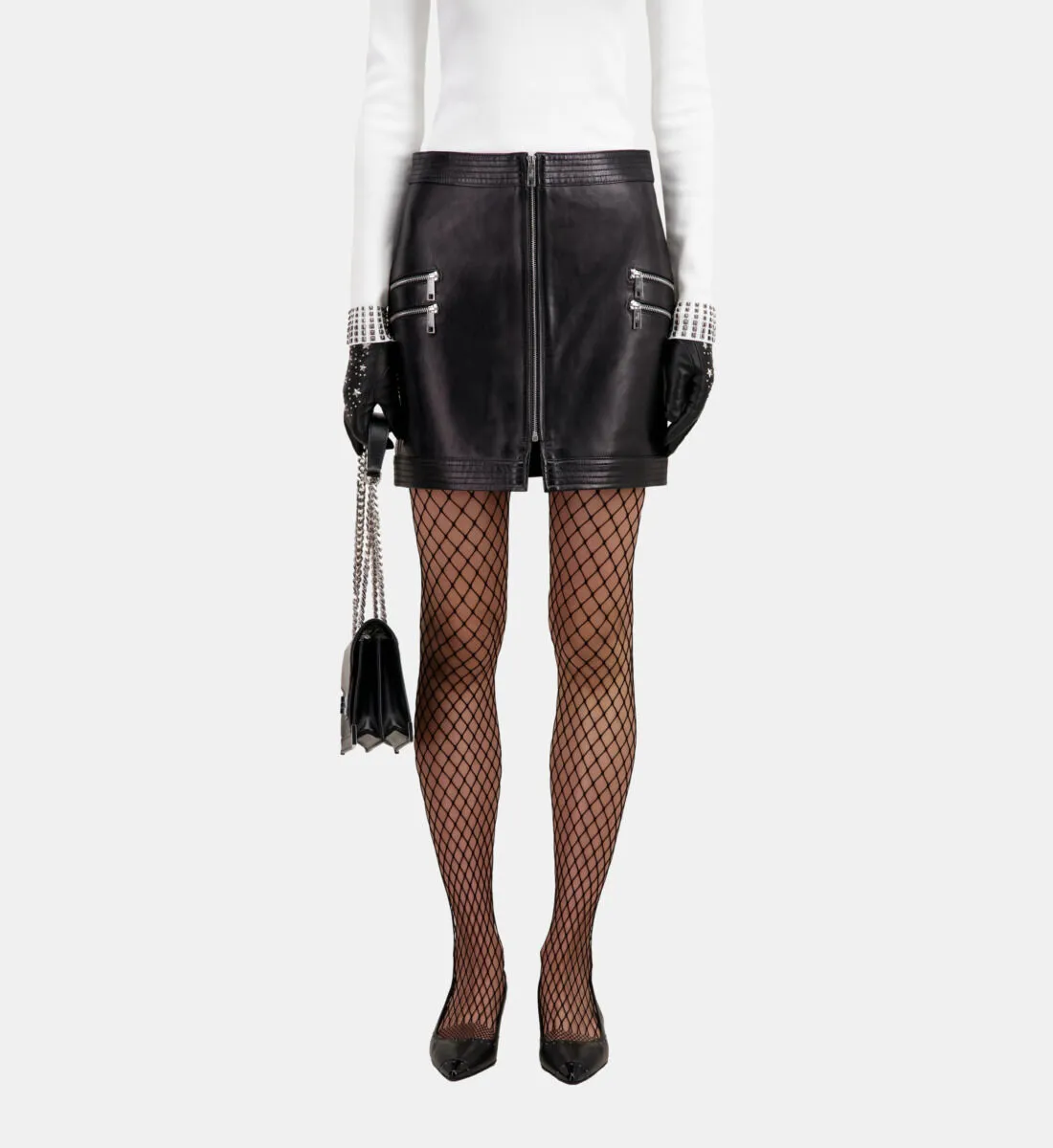 Short black leather skirt