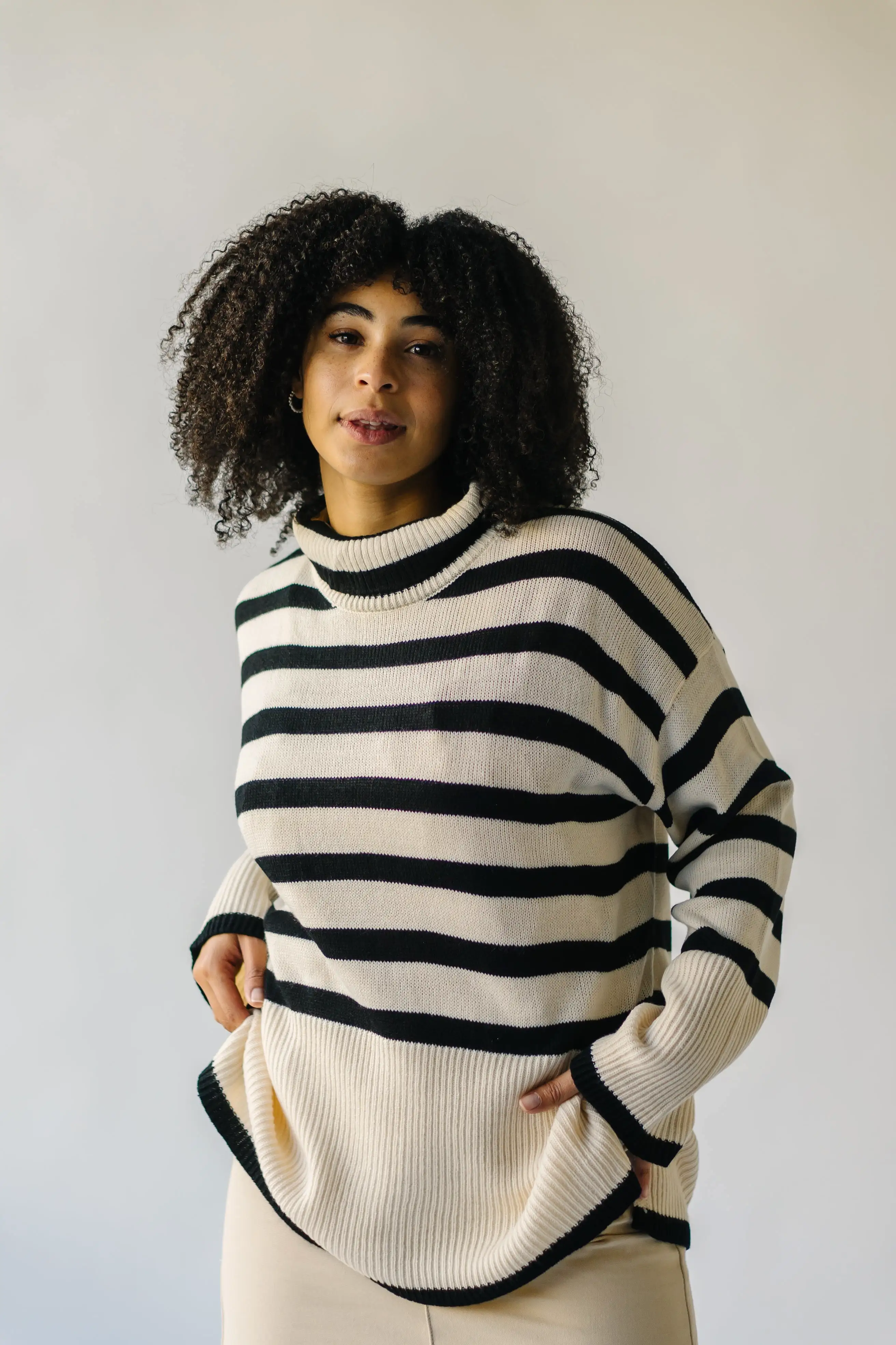 The Bryson Striped Turtleneck Sweater in Cream + Black