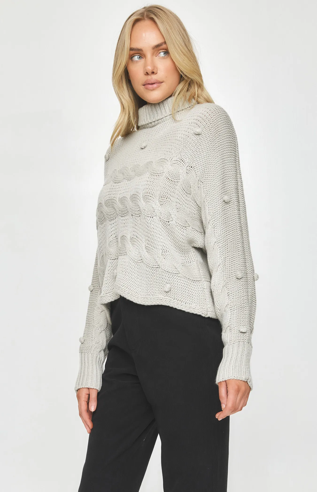 Turtleneck Knit with Pom Pom and Plaited Details (SKN533)